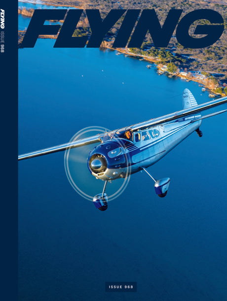 Cover of 'Flying' magazine with a blue airplane flying over water and land.