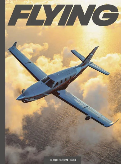 Magazine cover with an airplane flying through clouds and the word 'FLYING' at the top.