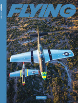 Magazine cover with a vintage airplane and 'FLYING' branding